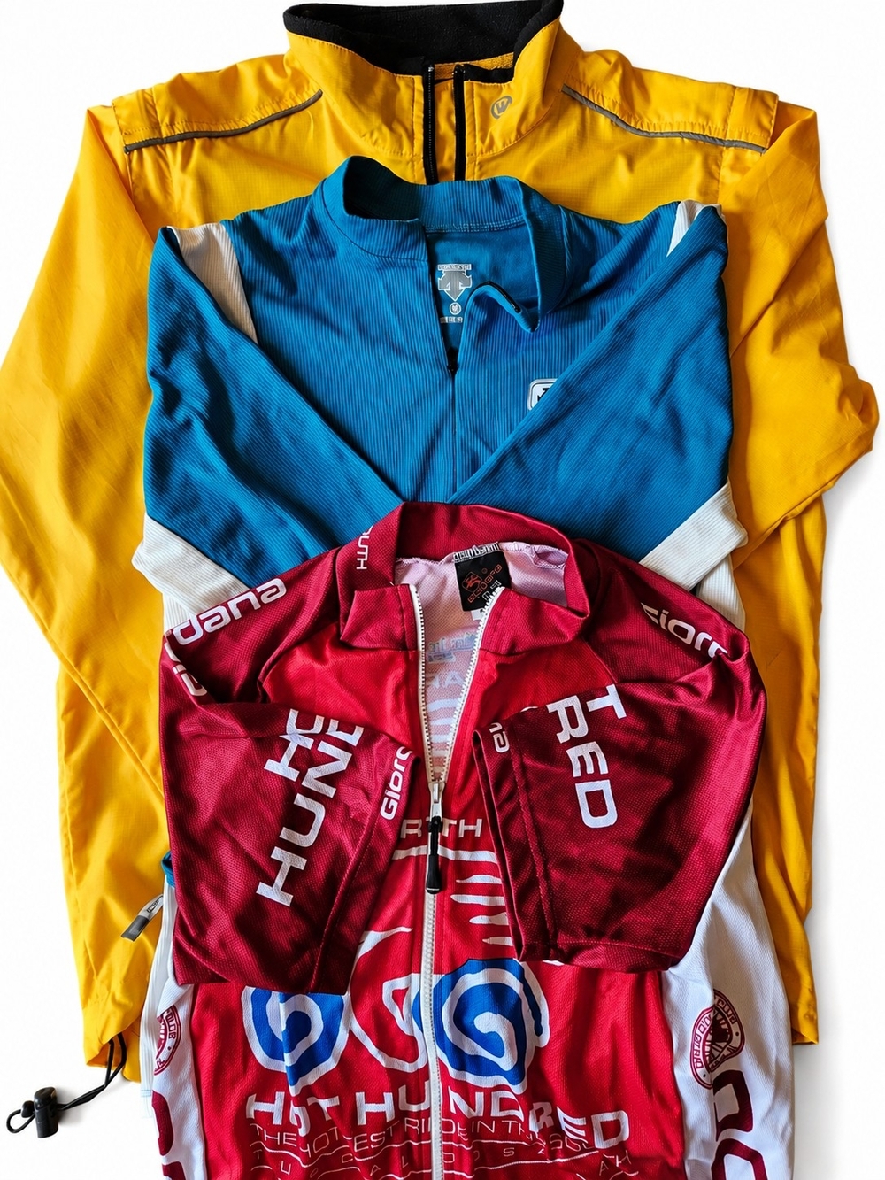 Bundle Of 3 Women's Cycling Jacket And Jerseys, Yellow, Blue, Red.